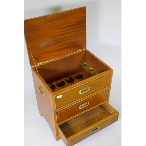 1008 - A campaign style inlaid yew wood veneered cellarette, with lift up top and fitted interior, two fals... 