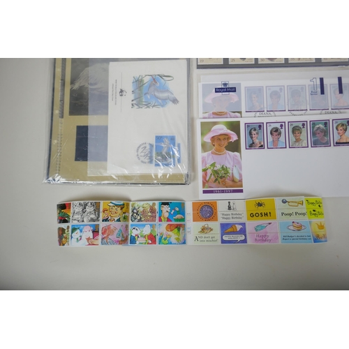 102 - A quantity of world stamps, First Day covers and complete and unused stamp books