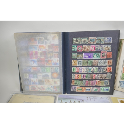 102 - A quantity of world stamps, First Day covers and complete and unused stamp books