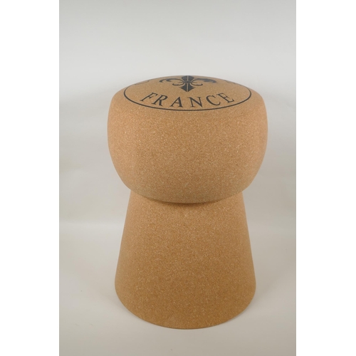 1031 - A cork and metal stool in the form of a Champagne cork, 51cm high