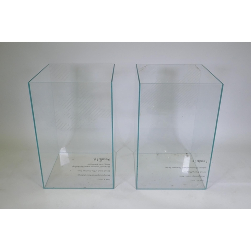 1037 - A pair of large glass display plinths/planters, formerly used by McLaren Racing, 48 x 48cm, 75cm hig... 