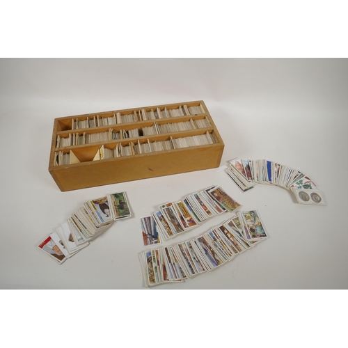 104 - A large quantity of vintage Wills and Players cigarette cards, in a bespoke collectors box 