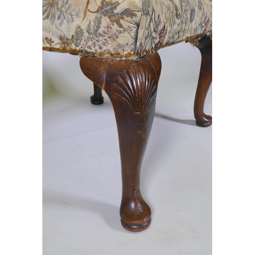 1042 - A Georgian walnut footstool on carved cabriole legs, 58 x 67cm