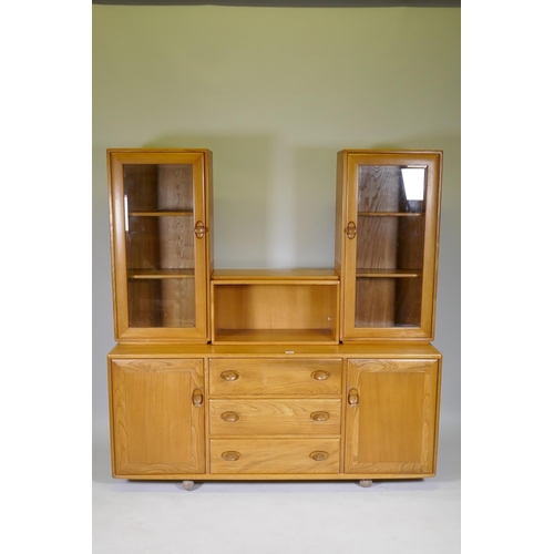 1047 - A mid century Ercol elm Windsor high back sideboard/display cabinet, with glazed upper section, 156 ... 