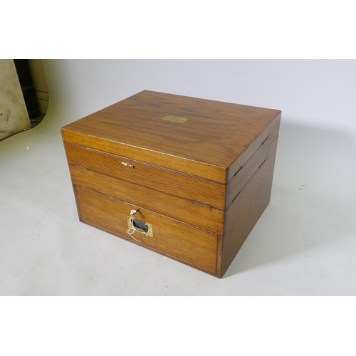 1049 - A late C19th/early C20th oak campaign canteen/box, with fold out sections, 56 x 46cm, 36cm high