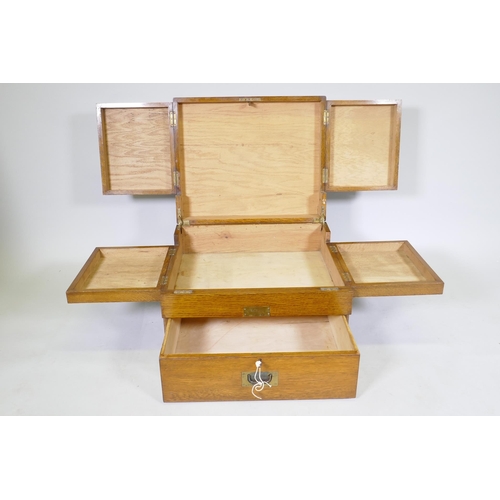 1049 - A late C19th/early C20th oak campaign canteen/box, with fold out sections, 56 x 46cm, 36cm high