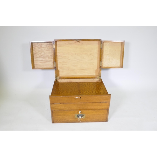 1049 - A late C19th/early C20th oak campaign canteen/box, with fold out sections, 56 x 46cm, 36cm high