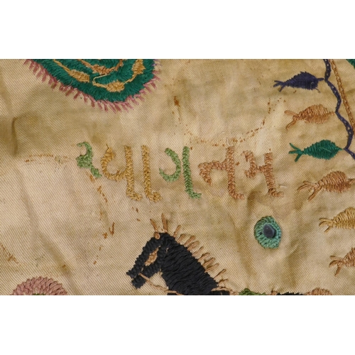 105 - A C19th Indian embroidered wall hanging decorated with depictions of Ganesh, peacocks, elephants, co... 