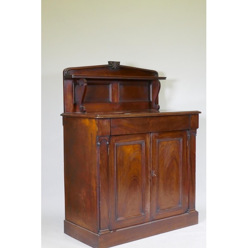 1057 - A C19th Regency style Colonial figured hardwood chiffonier, the upper shelf with scroll supports, a ... 