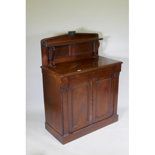 1057 - A C19th Regency style Colonial figured hardwood chiffonier, the upper shelf with scroll supports, a ... 