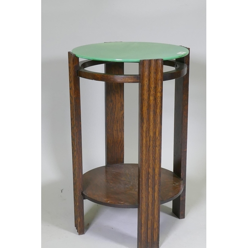 1059 - An Art Deco occasional table with marbled green glass top and undertier, 66cm high x 42cm diameter