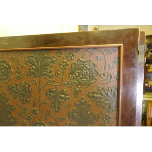 1065 - A Victorian mahogany four fold screen with faux leather and mirrored panels, AF, each fold 63 x 183c... 