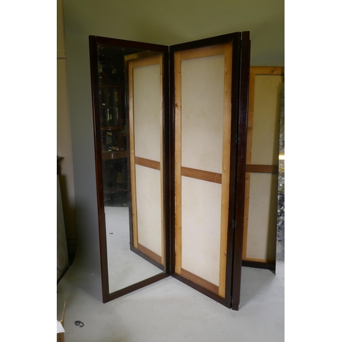 1065 - A Victorian mahogany four fold screen with faux leather and mirrored panels, AF, each fold 63 x 183c... 