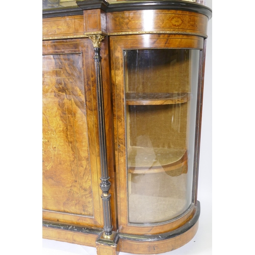 1071 - A Victorian inlaid figured walnut side cabinet, the mirrored back with galleried shelves, the base w... 