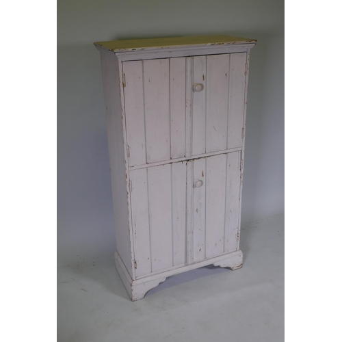 1075 - A French painted pine store cabinet, 66 x 30cm, 122cm high