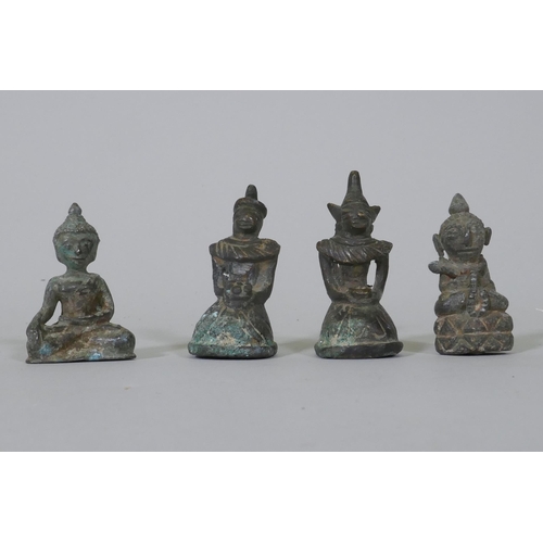 109 - Four Eastern bronze miniature Buddhivistic figures, 5cm high