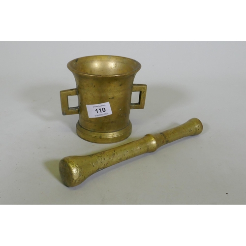 110 - Antique bronze pestle and mortar, pestle 25cm long