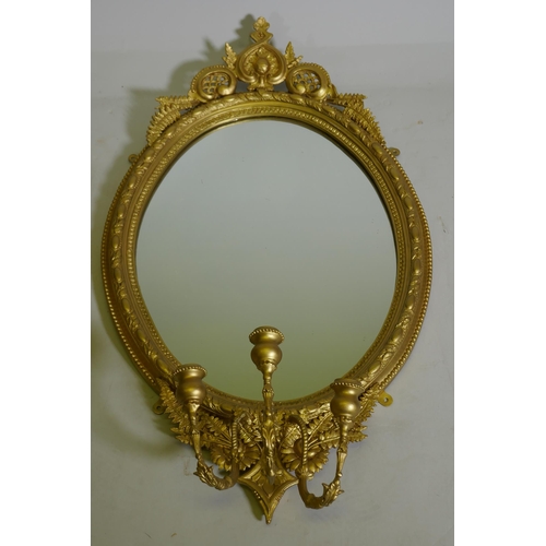 1101 - A pair of Victorian giltwood and composition three branch girondelle wall mirrors, 96cm long