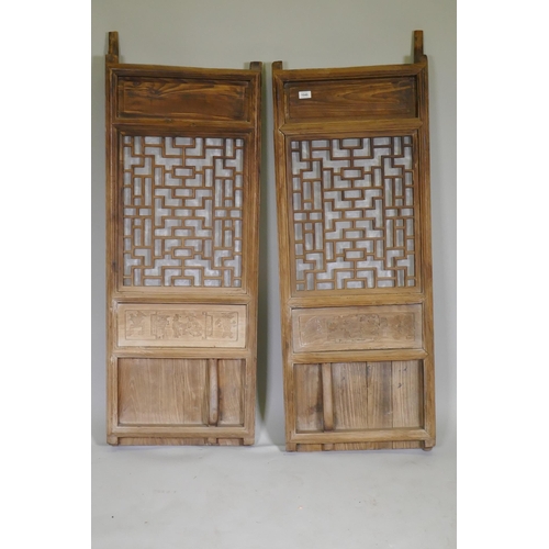 1107 - A pair of Chinese elm door panels, 50 x 140cm