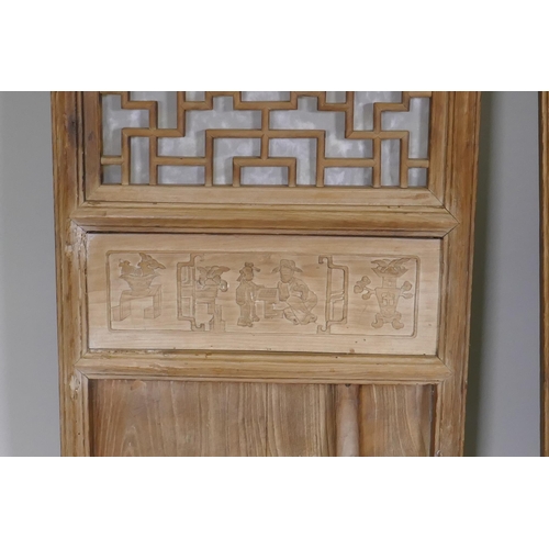 1107 - A pair of Chinese elm door panels, 50 x 140cm