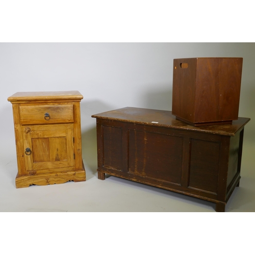 1109 - An oak veneered triple panel coffer raised on stile supports, 88 x 44 x 46cm, together with a fruitw... 