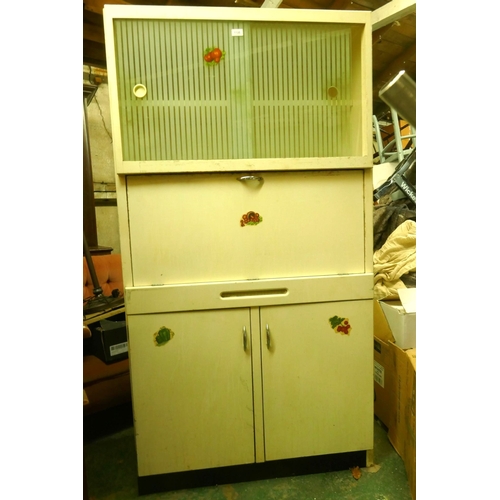 1135 - A mid century painted kitchen cabinet with etched sliding doors over a fall front and two cupboards,... 