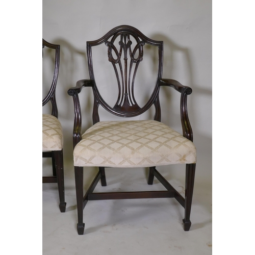 1136 - A set of eight (six plus two) Hepplewhite style shield back chairs, with over stuffed serpentine fro... 