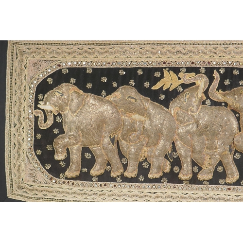 115 - A vintage Burmese Kalaga (stumpwork) elephant textile with metal sequins, crystal and glass beads, a... 