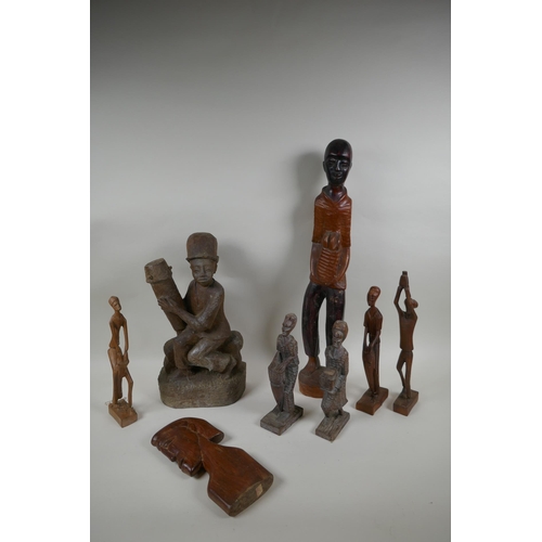 117 - A collection of vintage African carved hardwood figures, largest 56cm high