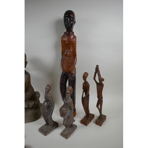 117 - A collection of vintage African carved hardwood figures, largest 56cm high