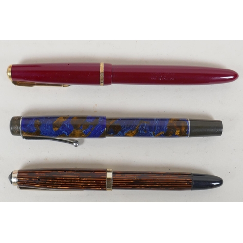 121 - A large collection of vintage fountain pens, propelling pencils and ballpoint pens, including a Conw... 