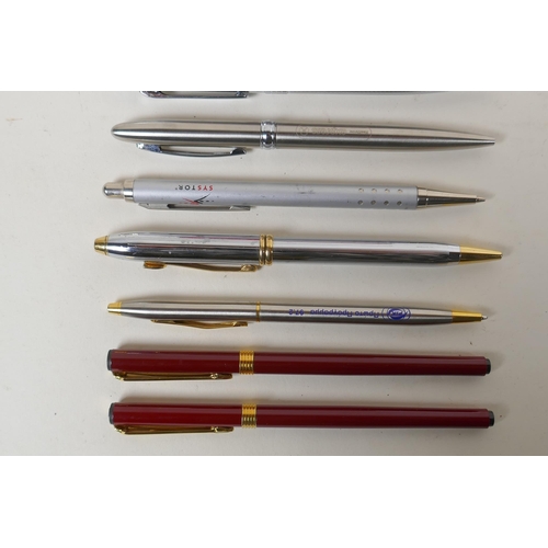 121 - A large collection of vintage fountain pens, propelling pencils and ballpoint pens, including a Conw... 