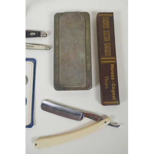 132 - A quantity of gentleman's bijouterie to include a French cut throat, Le Talisman razor, a Rolls razo... 