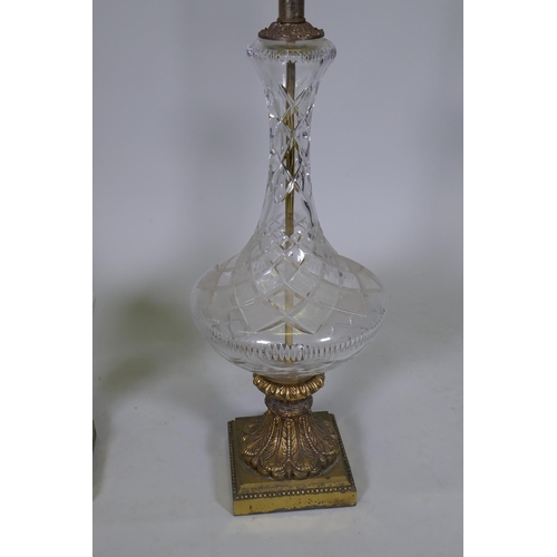 14 - A pair of vintage cut glass table lamps with brass mounts and bases, 76cm high