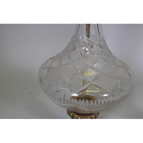 14 - A pair of vintage cut glass table lamps with brass mounts and bases, 76cm high