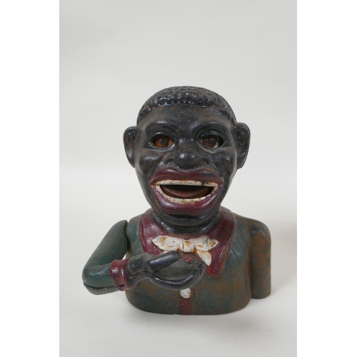 141 - A vintage American painted cast iron mechanical figural money box and another similar, largest 20cm ... 