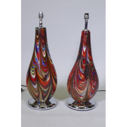 144 - A matched pair of Murano glass style table lamps, with swirled decoration and chromed bases, 55cm hi... 