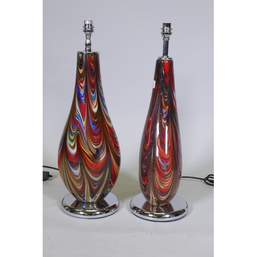 144 - A matched pair of Murano glass style table lamps, with swirled decoration and chromed bases, 55cm hi... 