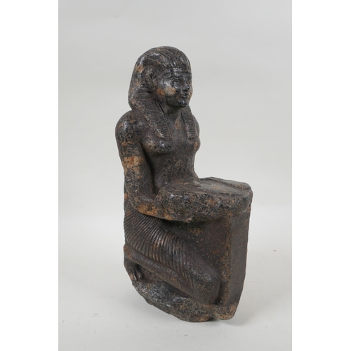 15 - An antique Egyptian carved granite figural statue with a tray of fish, hieroglyphic inscription vers... 