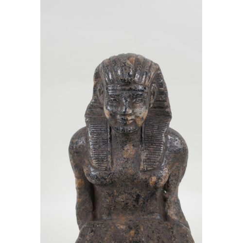 15 - An antique Egyptian carved granite figural statue with a tray of fish, hieroglyphic inscription vers... 