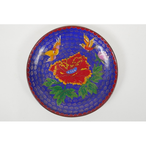 150 - A Chinese cloisonne dish decorated with birds and flowers on a blue ground, auspicious symbol and ba... 