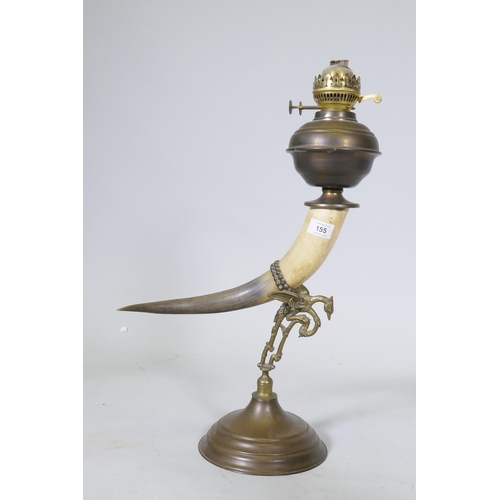 155 - Antique oil lamp with horn body and brass mounts and reservoir, 60cm high