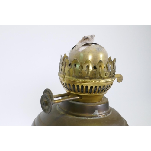 155 - Antique oil lamp with horn body and brass mounts and reservoir, 60cm high