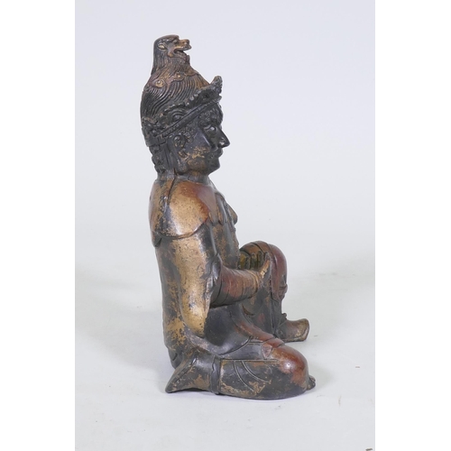 156 - A Chinese bronze figure of an immortal, with red and gilt patination, impressed seal mark to base, 2... 