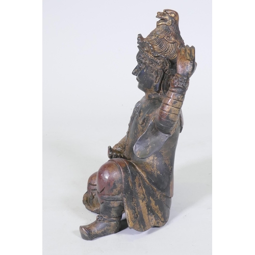 156 - A Chinese bronze figure of an immortal, with red and gilt patination, impressed seal mark to base, 2... 