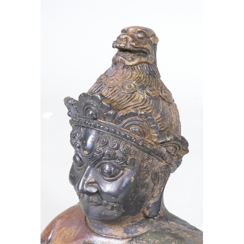 156 - A Chinese bronze figure of an immortal, with red and gilt patination, impressed seal mark to base, 2... 