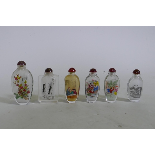 159 - Six Chinese reverse decorated glass snuff bottles, largest 10cm high