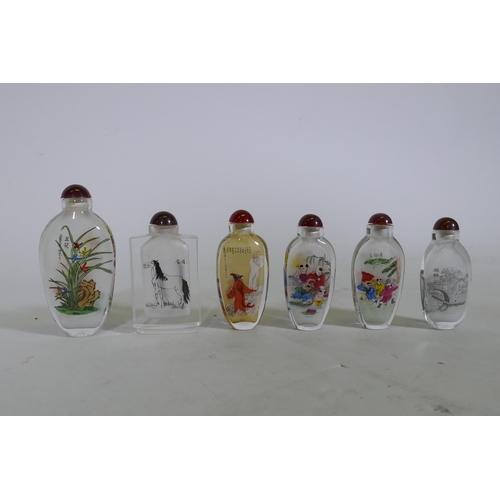 159 - Six Chinese reverse decorated glass snuff bottles, largest 10cm high