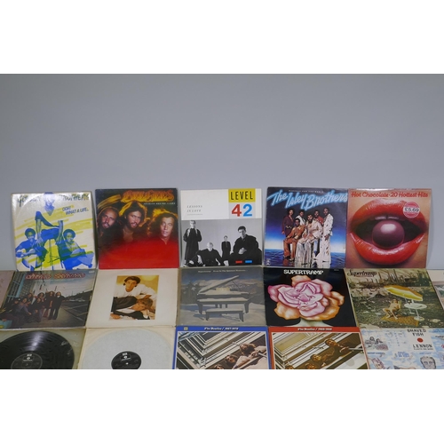 16 - A quantity of 1960s and '70s vinyl LPs including The Beatles 'Rock N Roll Music', 'The White Album',... 