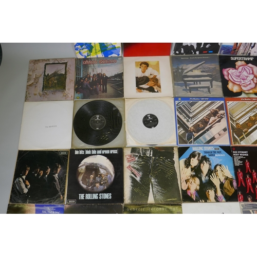 16 - A quantity of 1960s and '70s vinyl LPs including The Beatles 'Rock N Roll Music', 'The White Album',... 